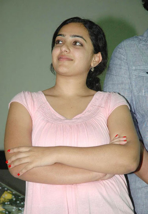 nithya menon in pink sleeve less top hot photoshoot